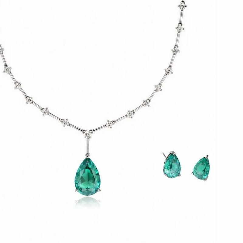 conjunto-gota-cristal-verde-rodio-branco-yuriko Tendências de Semijoias para 2026: O Que Vai Brilhar na Moda Feminina
